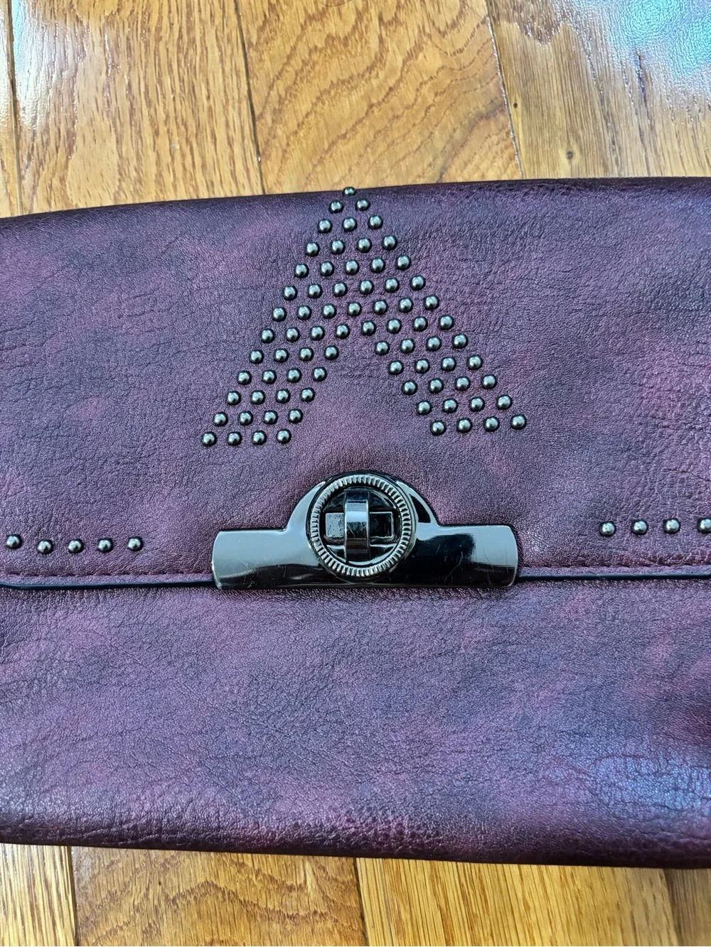 Studded Plum Leather Clutch with Turn-Lock Closure